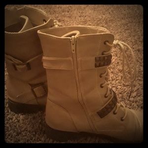 Some Brown Boots With Beading On The Bands